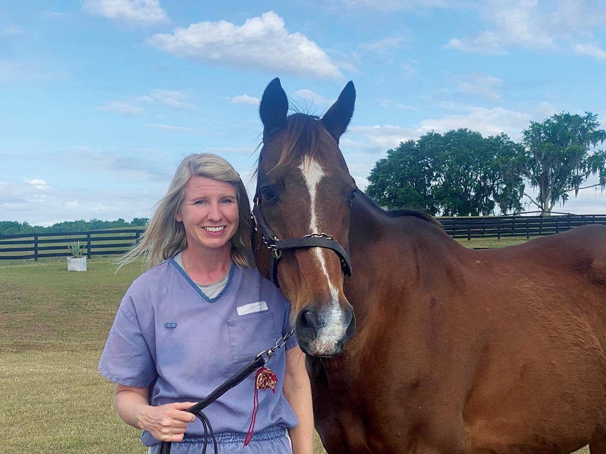 An inmate with a retired Thoroughbred at the TRF's Second Chances Program