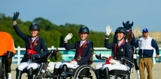 The gold-medal winning U.S. Para Dressage Team at the 2024 Paris Paralympics. From left to right: Rebecca Hart, Fiona Howard, and Roxanne Trunnell.