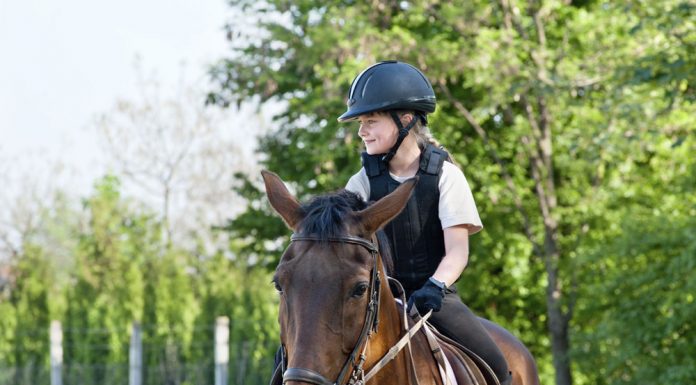 Kid riding a horse