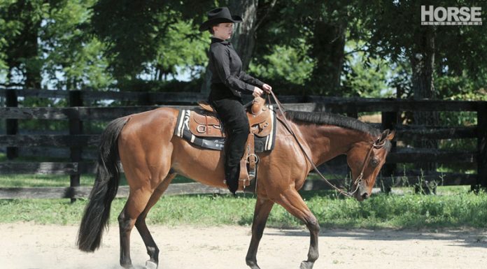 A women riding a horse