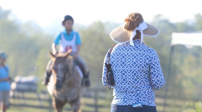 Mom and kid at a horse show