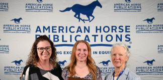 Horse Illustrated Editor in Chief Holly Caccamise (center) accepts an award from Barrie Reightler, AHP President