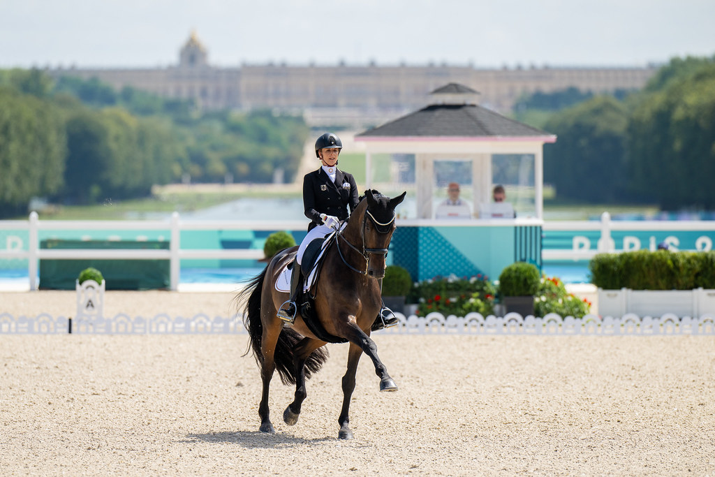 Jessica von Bredow-Werndl (GER) riding TSF Dalera BB during the Dressage Grand Prix Freestyle with the Palace of Versailles as the backdrop at the 2024 Paris Olympic Games