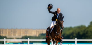 Michael Jung aboard Chipmunk FRH celebrates his history third individual gold medal in eventing