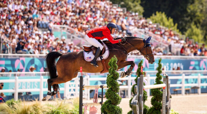 Laura Kraut and Baloutinue go clear in the team jumping qualifier at the 2024 Paris Olympics