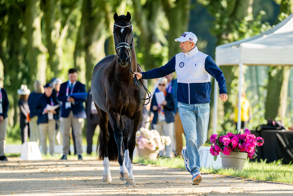 U.S. Olympic Dressage Team member Marcus Orlob presents Jane at the Dressage First Horse Inspection for the Palace of Versailles