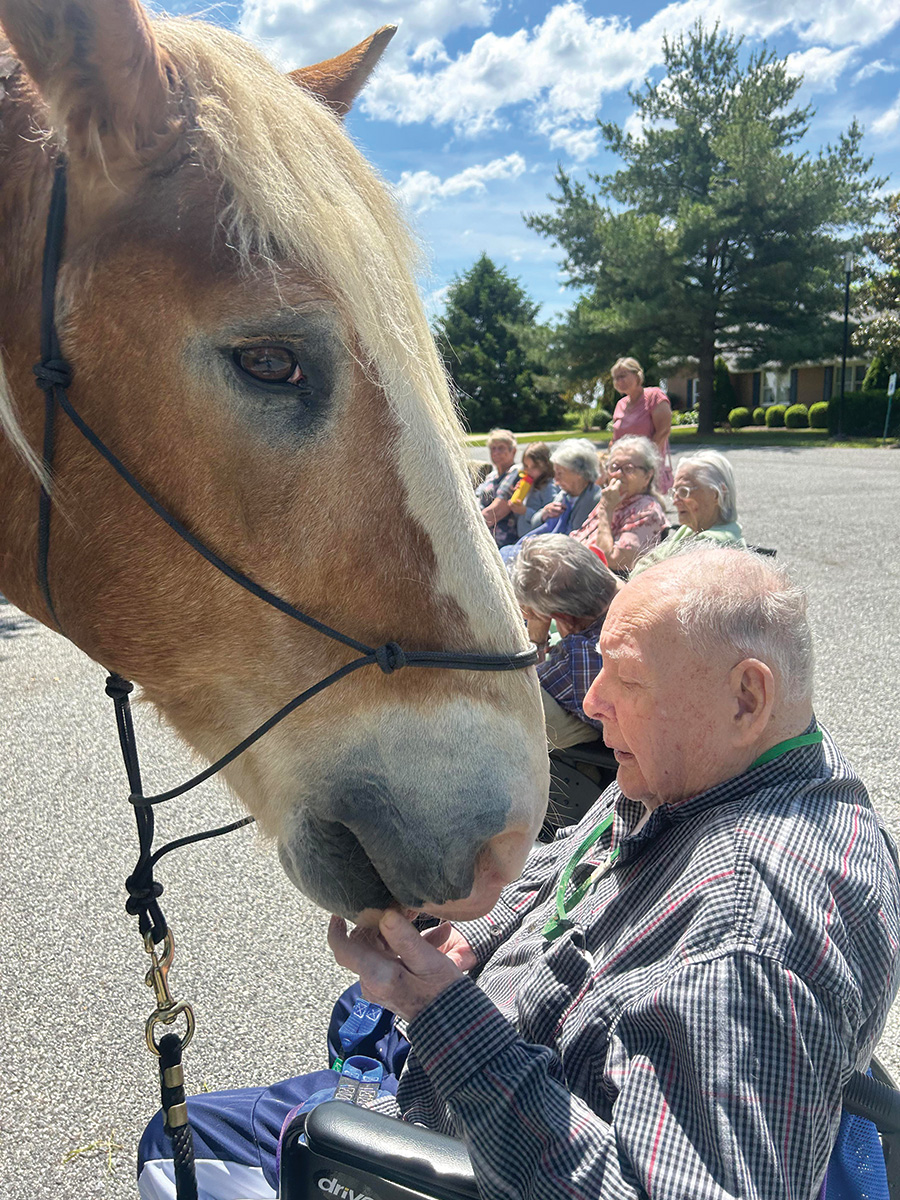 Clyde doing his job at a senior center.