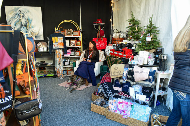 A vendor displays her wares in the 2024 Maryland Five Star Trade Fair