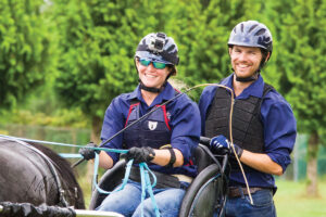 Carrie Ostrowski-Place and her husband, Travis Place, driving