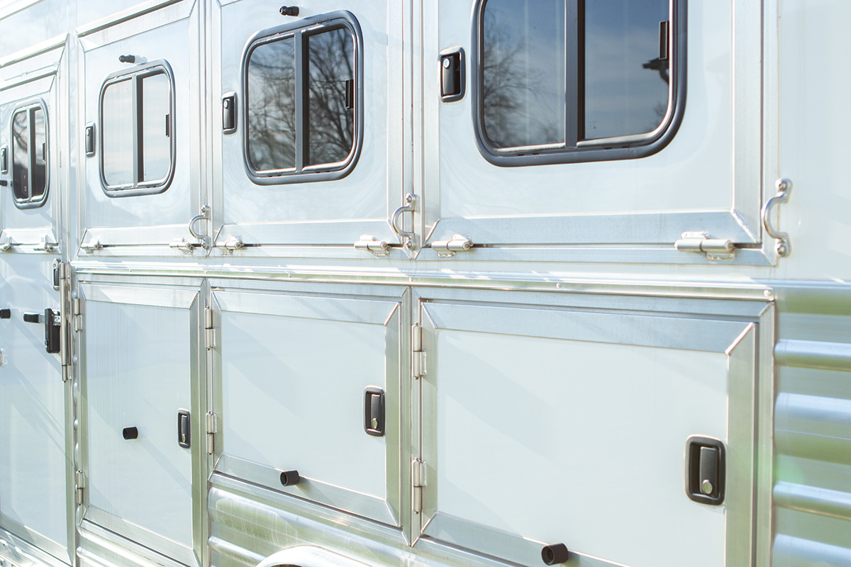 Horse trailer windows. Test locks and seals on all windows and doors for proper maintenance.