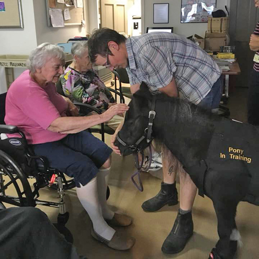 A "Pony in Training" visiting a nursing home