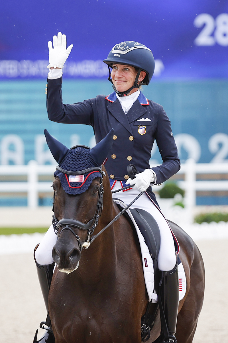 Liz Halliday and Nutcracker exit the ring after scoring a 28.0 in eventing dressage at the Paris Olympics 2024