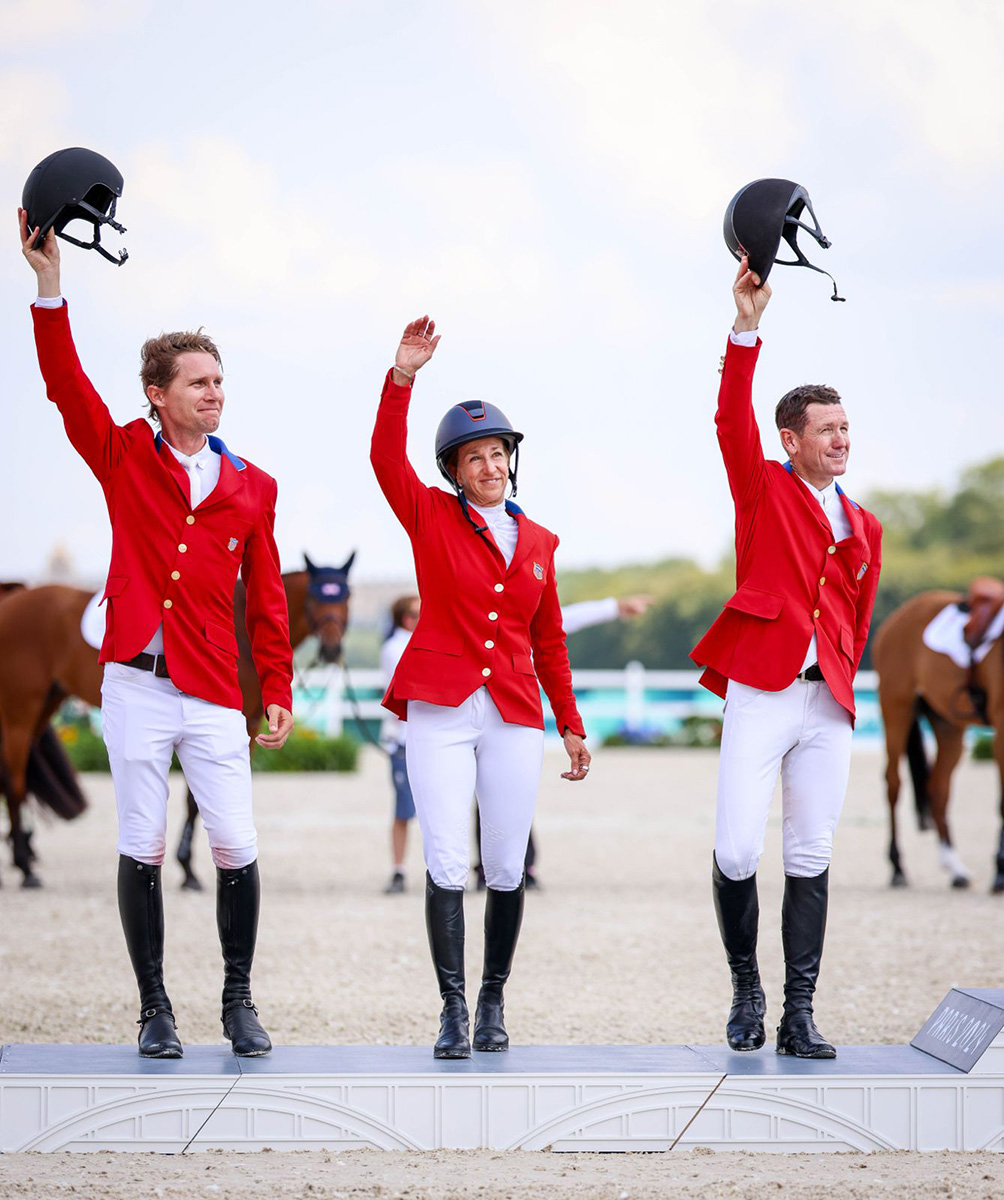 The U.S. Show Jumping team on the podium with their silver medals