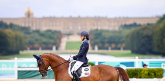 Fiona Howard and Diamond Dunes with the Palace of Versailles as the backdrop